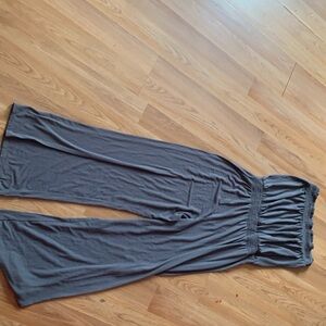 this is a grey sleeveless all in one bell bottom
